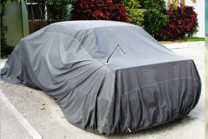 Bien choisir une housse de protection pour une voiture qui dort au garage